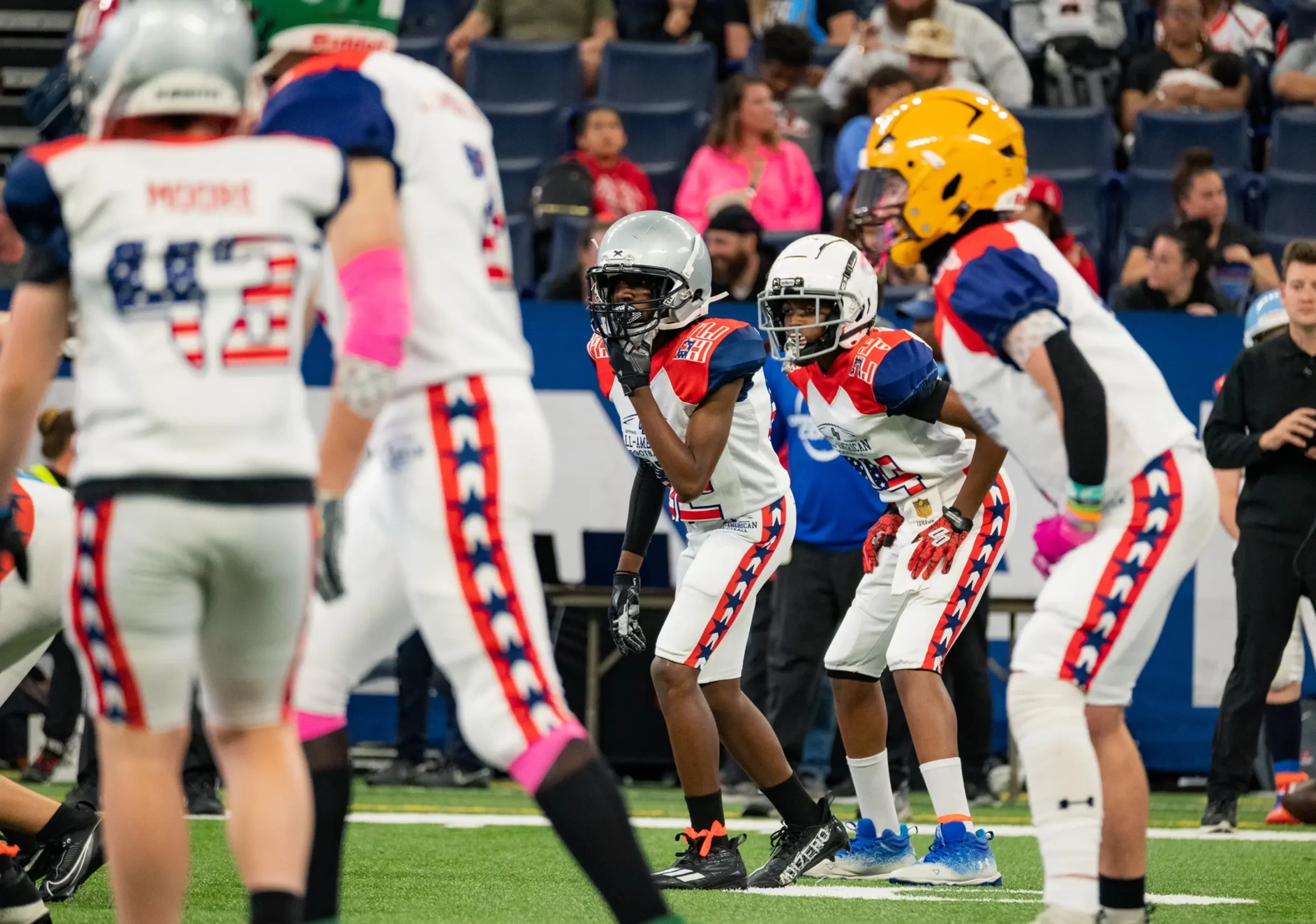 Young players on the field at the All-American Bowl