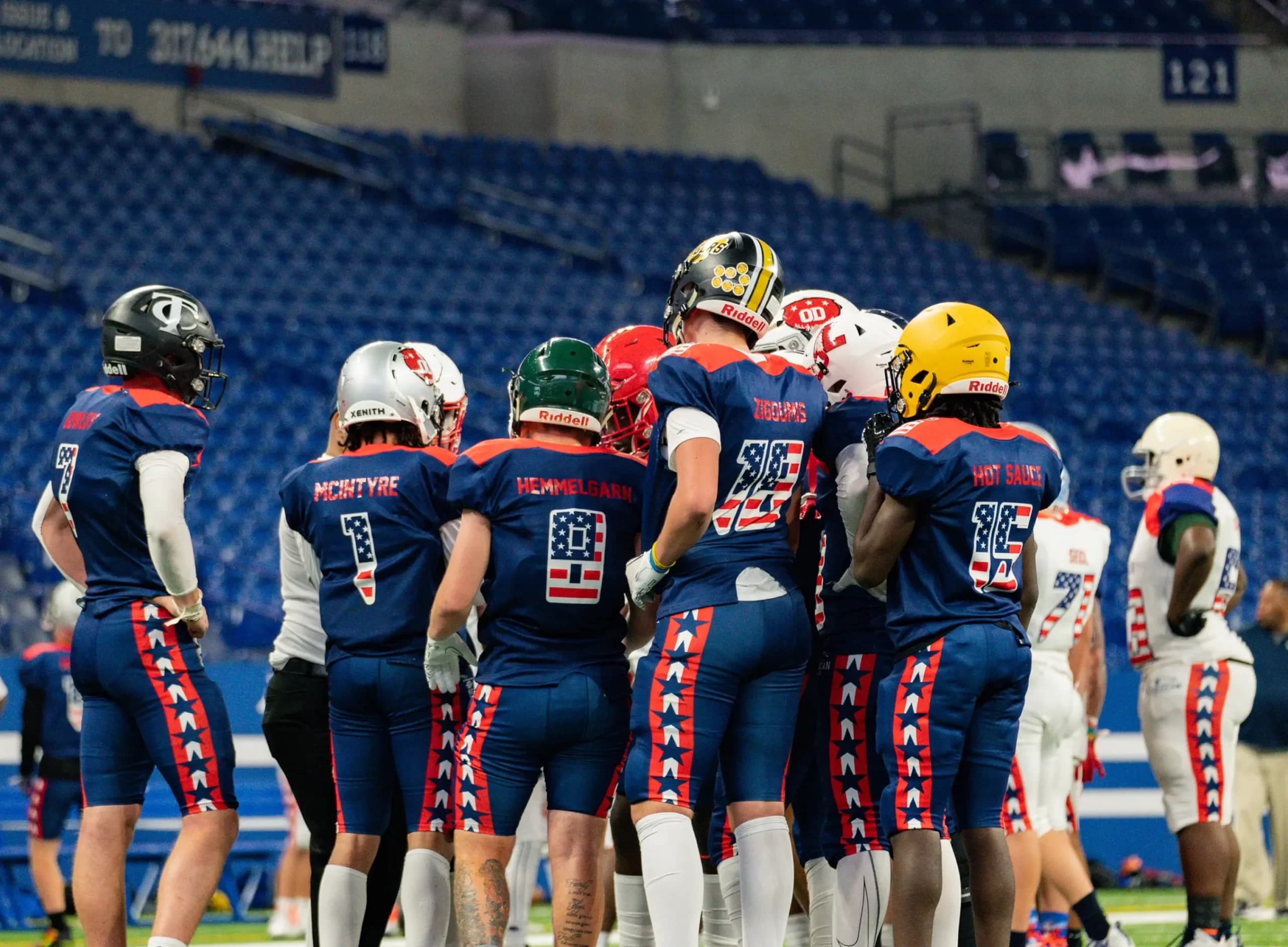 Campers huddled up at the All-American Bowl