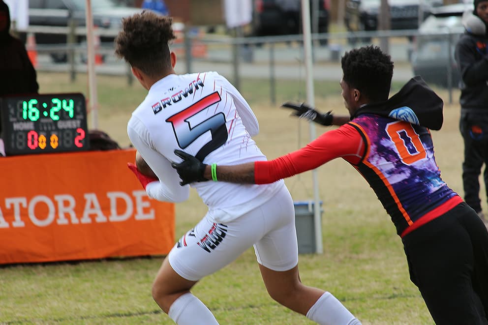 A catch in traffic at an O-D 7v7 tournament